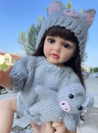 reborn girl doll with curly brown hair 55 cm realistic silicone baby reborn girl doll with curly brown hair 55 cm realistic silicone baby