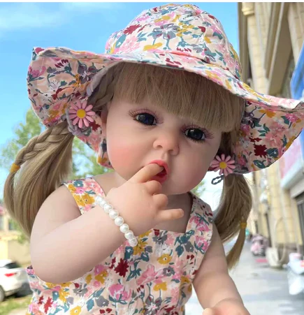 reborn girl doll with curly brown hair 55 cm realistic silicone baby reborn girl doll with curly brown hair 55 cm realistic silicone baby